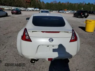 2014 Nissan 370Z Touring with VIN JN1AZ4EH1EM635411, listed as a Copart auction lot 82670344 with 77,501 mi miles and Salvage Title. Bid and sale history available at carsss.com. Image 6.