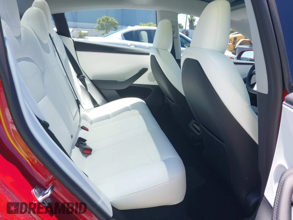 2025 Tesla Model 3 Long Range with VIN 5YJ3E1EA6SF917745, listed as a IAAI auction lot 42533673 with 7,305 mi miles and . Bid and sale history available at DreamBid. Image 8.