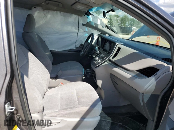 2017 Toyota Sienna L with VIN 5TDZZ3DC5HS818593, listed as a Copart auction lot 56942894 with 114,359 mi miles and Salvage Title. Bid and sale history available at DreamBid. Image 7.