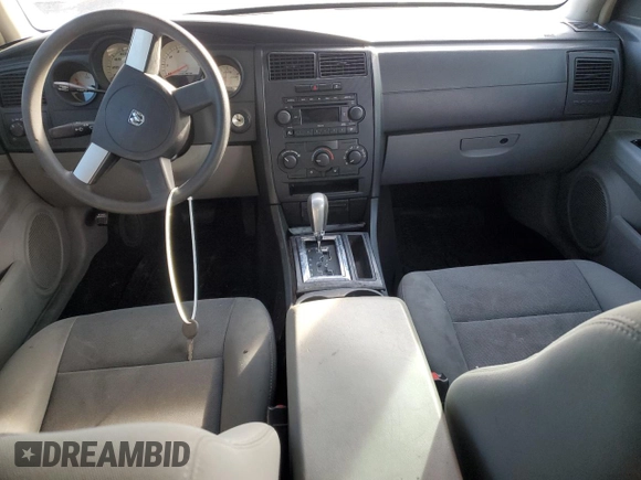 2007 Dodge Charger with VIN 2B3KA43R87H676386, listed as a Copart auction lot 46897315 with 128,922 mi miles and Clean Title. Bid and sale history available at DreamBid. Image 8.