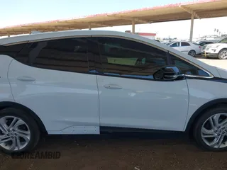 2023 Chevrolet Bolt EV 1LT z VIN 1G1FW6S0XP4112907, wystawiony jako IAAI lot #42250871 z przebiegiem 25 219 mil mil oraz . Historia ofert i sprzedaży dostępna na DreamBid. Obrazek 13.