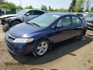 2006 Honda Civic LX with VIN 2HGFA16576H014581, listed as a Copart auction lot 60425895 with 323,271 mi miles and Clean title. Bid and sale history available at DreamBid. Image 1.