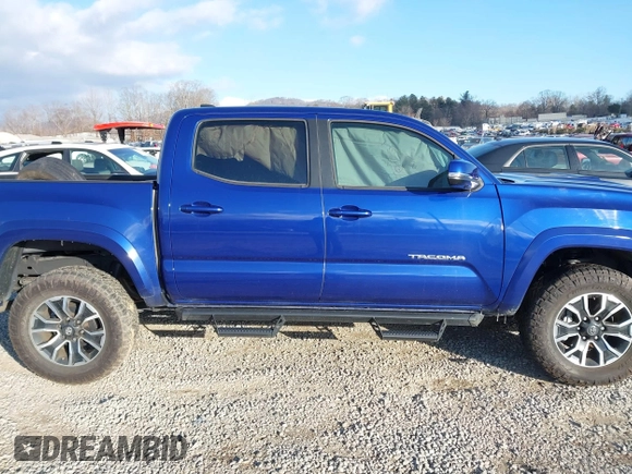 2023 Toyota Tacoma 4WD SR with VIN 3TYCZ5AN1PT119133, listed as a IAAI auction lot 41574906 with 19,887 mi miles. Bid and sale history available at carsss.com. Image 12.