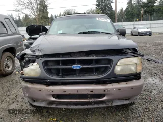 1995 Ford Explorer z VIN 1FMCU24X8SUA09153, wystawiony jako Copart lot #87551015 z przebiegiem 143 069 mil mil oraz Szkoda całkowita • Salvage title. Historia ofert i sprzedaży dostępna na DreamBid. Obrazek 5.