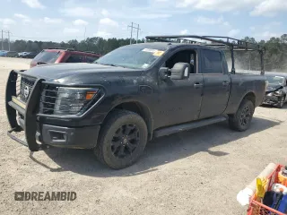 2018 Nissan Titan XD SV with VIN 1N6BA1F41JN517296, listed as a Copart auction lot 49090835 with 210,589 mi miles and Clean Title. Bid and sale history available at carsss.com. Image 1.