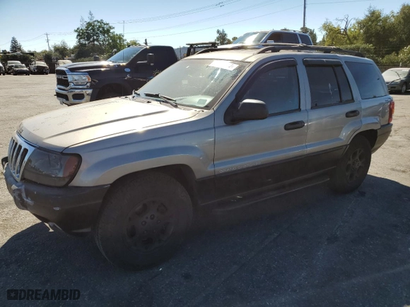 1999 Jeep Grand Cherokee Laredo with VIN 1J4GW58N4XC739465, listed as a Copart auction lot 76130544 with 195,649 mi miles and Salvage Title. Bid and sale history available at carsss.com. Image 1.