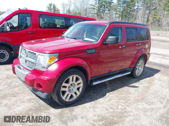 2011 Dodge Nitro Heat with VIN 1D4PU4GK2BW514520, listed as a IAAI auction lot 41919743 with 128,702 mi miles. Bid and sale history available at carsss.com. Image 2.