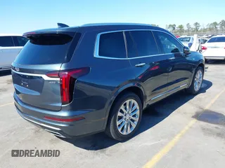 2021 Cadillac XT6 Premium Luxury with VIN 1GYKPERS0MZ110029, listed as a IAAI auction lot 41669104 with 58,890 mi miles and . Bid and sale history available at DreamBid. Image 4.