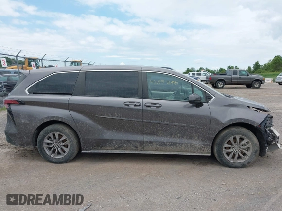 2021 Toyota Sienna LE with VIN 5TDKRKEC9MS034194, listed as a IAAI auction lot 42552990 with 21,633 mi miles and . Bid and sale history available at DreamBid. Image 14.