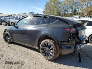 2024 Tesla Model Y Performance z VIN 7SAYGDEF4RF064207, wystawiony jako Copart lot #49477615 z przebiegiem Nie podano mil oraz Czysty tytuł • Clean title. Historia ofert i sprzedaży dostępna na DreamBid. Obrazek 2.