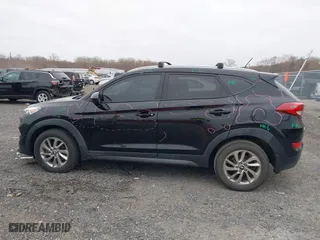 2016 Hyundai Tucson SE with VIN KM8J33A4XGU179953, listed as a IAAI auction lot 41771885 with 103,139 mi miles. Bid and sale history available at carsss.com. Image 14.