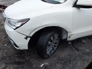 2016 Acura MDX w/Tech with VIN 5FRYD3H49GB008253, listed as a IAAI auction lot 41564115 with 127,500 mi miles. Bid and sale history available at carsss.com. Image 6.