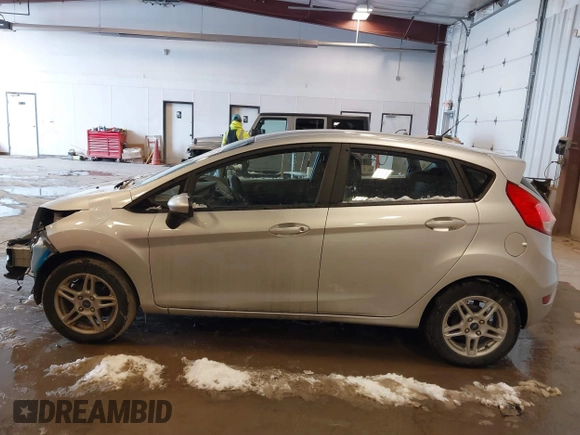 2019 Ford Fiesta SE with VIN 3FADP4EJ8KM142043, listed as a IAAI auction lot 41592365 with 55,005 mi miles and . Bid and sale history available at carsss.com. Image 14.