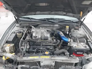 2002 Nissan Maxima GLE z VIN JN1DA31A32T308663, wystawiony jako IAAI lot #42136460 z przebiegiem 235 632 mil mil oraz . Historia ofert i sprzedaży dostępna na DreamBid. Obrazek 10.