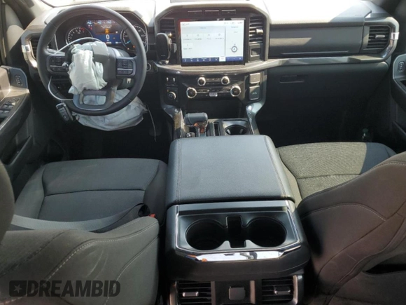 2023 Ford F-150 XL with VIN 1FTFW1E81PFA70563, listed as a Copart auction lot 60440685 with 31,198 mi miles and Salvage title. Bid and sale history available at DreamBid. Image 8.