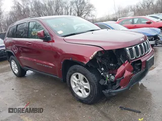2017 Jeep Grand Cherokee Laredo with VIN 1C4RJFAG2HC682716, listed as a IAAI auction lot 41213760 with 116,519 mi miles. Bid and sale history available at carsss.com. Image 1.
