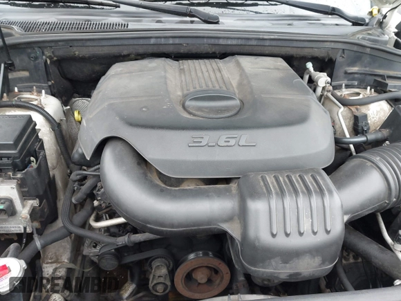 2011 Jeep Grand Cherokee Laredo z VIN 1J4RR4GG1BC572827, wystawiony jako IAAI lot #42313674 z przebiegiem 273 215 mil mil oraz . Historia ofert i sprzedaży dostępna na DreamBid. Obrazek 10.