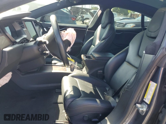 2019 Tesla Model S 75D with VIN 5YJSA1E2XKF305595, listed as a Copart auction lot 51838965 with Not provided miles and Salvage title. Bid and sale history available at DreamBid. Image 7.