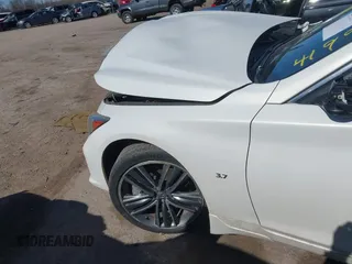 2015 Infiniti Q50 Premium z VIN JN1BV7AR0FM403268, wystawiony jako IAAI lot #41994978 z przebiegiem 125 399 mil mil oraz . Historia ofert i sprzedaży dostępna na DreamBid. Obrazek 6.