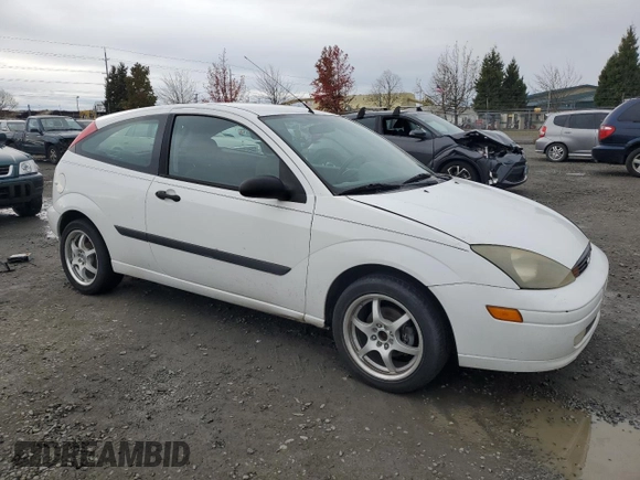 2003 Ford Focus ZX3 with VIN 3FAFP31Z83R182271, listed as a Copart auction lot 82415004 with 211,193 mi miles and Salvage title. Bid and sale history available at DreamBid. Image 4.