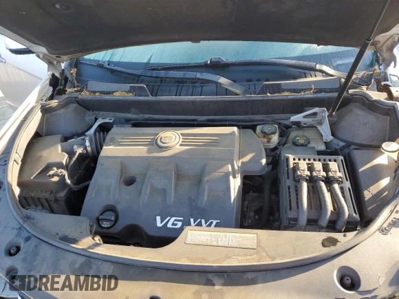 2011 Cadillac SRX z VIN 3GYFNGEY4BS544204, wystawiony jako Copart lot #52277474 z przebiegiem 92 305 mil mil oraz Szkoda całkowita • Salvage title. Historia ofert i sprzedaży dostępna na DreamBid. Obrazek 11.