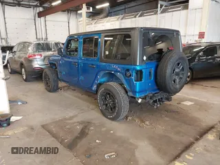 2021 Jeep Wrangler Unlimited Sport S with VIN 1C4HJXDG9MW797013, listed as a IAAI auction lot 41966754 with 53,583 mi miles. Bid and sale history available at carsss.com. Image 3.