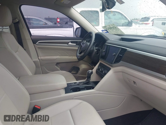 2021 Volkswagen Atlas SE with VIN 1V2JR2CA9MC595833, listed as a IAAI auction lot 42498528 with 69,670 mi miles and . Bid and sale history available at DreamBid. Image 5.