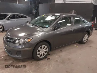 2011 Toyota Corolla L with VIN JTDBU4EE3BJ102060, listed as a IAAI auction lot 42140081 with 125,989 mi miles. Bid and sale history available at carsss.com. Image 2.