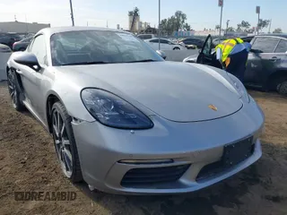 2021 Porsche Cayman with VIN WP0AA2A82MS260377, listed as a IAAI auction lot 40970360 with 23,785 mi miles and . Bid and sale history available at DreamBid. Image 1.