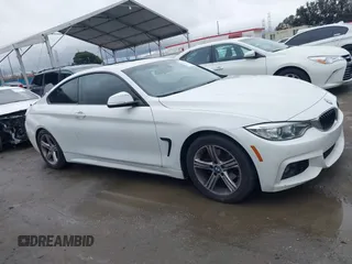 2015 BMW 4 Series 428i with VIN WBA3N7C58FK222925, listed as a IAAI auction lot 41776858 with 106,946 mi miles and . Bid and sale history available at carsss.com. Image 13.