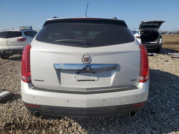 2016 Cadillac SRX Performance Collection with VIN 3GYFNCE38GS576027, listed as a Copart auction lot 52863115 with 85,615 mi miles and Salvage title. Bid and sale history available at DreamBid. Image 6.