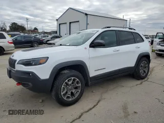 2020 Jeep Cherokee Trailhawk z VIN 1C4PJMBN9LD603540, wystawiony jako Copart lot #87912895 z przebiegiem 43 859 mil mil oraz Szkoda całkowita • Salvage title. Historia ofert i sprzedaży dostępna na DreamBid. Obrazek 1.