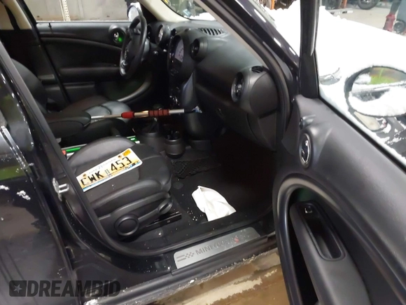 2014 MINI Countryman S with VIN WMWZC5C57EWP39161, listed as a IAAI auction lot 41342912 with 108,459 mi miles and . Bid and sale history available at DreamBid. Image 5.