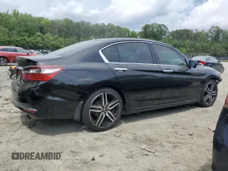 2017 Honda Accord Touring with VIN 1HGCR3F96HA019458, listed as a Copart auction lot 59915105 with 135,739 mi miles and Salvage title. Bid and sale history available at DreamBid. Image 3.