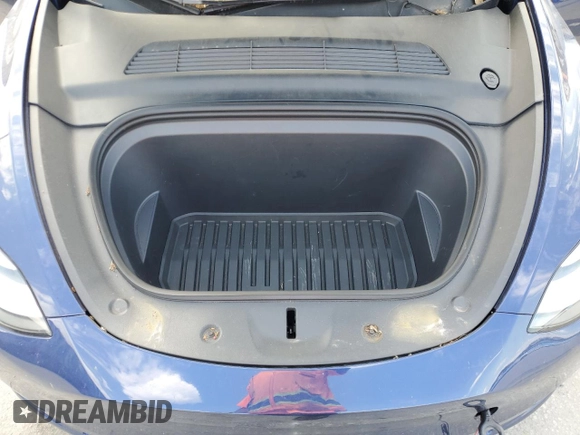 2022 Tesla Model Y Long Range with VIN 7SAYGAEE2NF390507, listed as a Copart auction lot 50986965 with 48,027 mi miles and Non Repairable. Bid and sale history available at DreamBid. Image 12.
