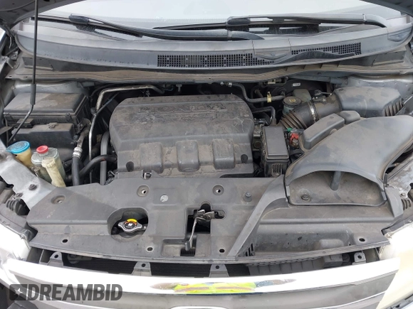 2012 Honda Odyssey EX-L with VIN 5FNRL5H66CB061847, listed as a IAAI auction lot 42162377 with 217,204 mi miles and . Bid and sale history available at DreamBid. Image 10.