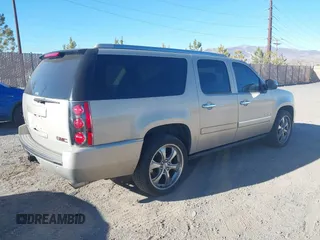 2010 GMC Yukon XL Denali with VIN 1GKUKMEF9AR193007, listed as a IAAI auction lot 41699599 with 201,440 mi miles. Bid and sale history available at carsss.com. Image 4.