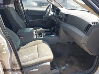 2005 Jeep Grand Cherokee Laredo with VIN 1J4GS48K45C633414, listed as a IAAI auction lot 41797842 with 311,852 mi miles. Bid and sale history available at carsss.com. Image 5.