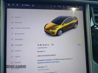 2020 Tesla Model X Long Range with VIN 5YJXCDE20LF265157, listed as a IAAI auction lot 41809572 with 58,599 mi miles. Bid and sale history available at carsss.com. Image 7.
