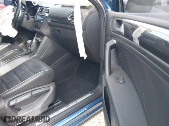 2018 Volkswagen Tiguan SEL Premium with VIN 3VV5B7AX0JM218427, listed as a IAAI auction lot 41188087 with 46,877 mi miles and . Bid and sale history available at DreamBid. Image 5.