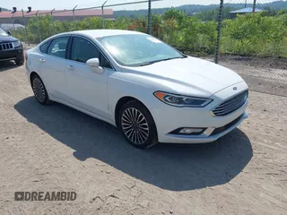 2017 Ford Fusion Titanium z VIN 3FA6P0K90HR168031, wystawiony jako IAAI lot #42578926 z przebiegiem 210 268 mil mil oraz . Historia ofert i sprzedaży dostępna na DreamBid. Obrazek 1.