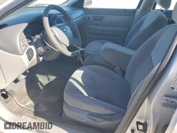 2005 Ford Taurus SE with VIN 1FAFP53U75A302281, listed as a Copart auction lot 53552465 with 100,413 mi miles and Salvage Title. Bid and sale history available at carsss.com. Image 7.