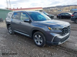 2025 Honda Pilot EX-L with VIN 5FNYG1H41SB033542, listed as a IAAI auction lot 41214018 with 5,787 mi miles. Bid and sale history available at carsss.com. Image 1.
