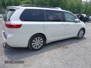 2015 Toyota Sienna XLE with VIN 5TDYK3DC3FS586329, listed as a IAAI auction lot 42496805 with 132,828 mi miles and . Bid and sale history available at DreamBid. Image 4.