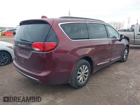 2017 Chrysler Pacifica Touring L z VIN 2C4RC1BG2HR535119, wystawiony jako IAAI lot #40891044 z przebiegiem 172 664 mil mil oraz . Historia ofert i sprzedaży dostępna na DreamBid. Obrazek 4.