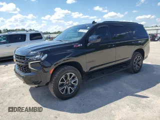 2021 Chevrolet Tahoe Z71 z VIN 1GNSKPKD7MR452421, wystawiony jako Copart lot #56736475 z przebiegiem 47 295 mil mil oraz Czysty tytuł • Clean title. Historia ofert i sprzedaży dostępna na DreamBid. Obrazek 1.