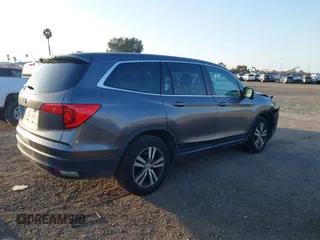 2017 Honda Pilot EX-L with VIN 5FNYF5H74HB010026, listed as a IAAI auction lot 41633770 with 170,383 mi miles and . Bid and sale history available at DreamBid. Image 14.