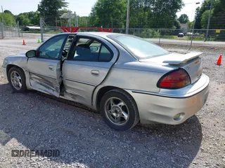 2004 Pontiac Grand Am GT z VIN 1G2NW52E74C179558, wystawiony jako IAAI lot #42191752 z przebiegiem 256 688 mil mil oraz . Historia ofert i sprzedaży dostępna na DreamBid. Obrazek 3.