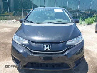 2015 Honda Fit LX z VIN 3HGGK5H56FM712266, wystawiony jako IAAI lot #42378228 z przebiegiem 140 423 mil mil oraz . Historia ofert i sprzedaży dostępna na DreamBid. Obrazek 6.