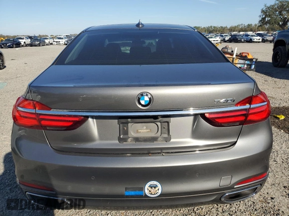 2016 BMW 7 Series 740i с VIN WBA7E2C51GG503912, выставлен на аукционе Copart как лот 47464895 с пробегом 160 322 миль миль и Списание • Salvage title. История ставок и продаж доступна на DreamBid. Изображение 6.